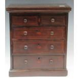 A 19th century inlaid apprentice chest, the moulded top above two short over three long drawers with