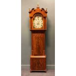 A 19th century mahogany longcase clock with painted arched dial and roman chapter ring, bearing
