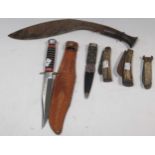 A small skean d'hu, a khukri knife, a hunting knife 'Sheriff, Brazil', and three other folding