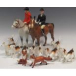 A Beswick Hunting group, tallest figure 22cm highMarkings and scratches throughout. Losses to some