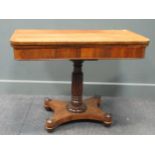 A late Regency crossbanded mahogany card table with green felt playing surface, on quatraform