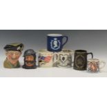 A collection of Wedgwood mugs, to include a Laura Knight commemorative mug; a Silver Jubilee mug;