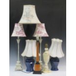 A pair of blue Denby ceramic lamps, a pair of two thin stemmed lamp base; together with an alabaster