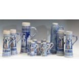 A collection of Westerwald steins of varying sizes, tallest 30.5cm (13)Markings and scratches to the