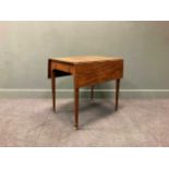 A late Georgian mahogany Pembroke table, the rectangular drop flap top over a single end drawer