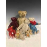 A 20th century Steiff articulated bear together with other later Steiff bears (qty)ear to heal 40cm,