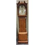 A late George III oak longcase clock with painted arched dial by Walker Nantwich, the arch decorated
