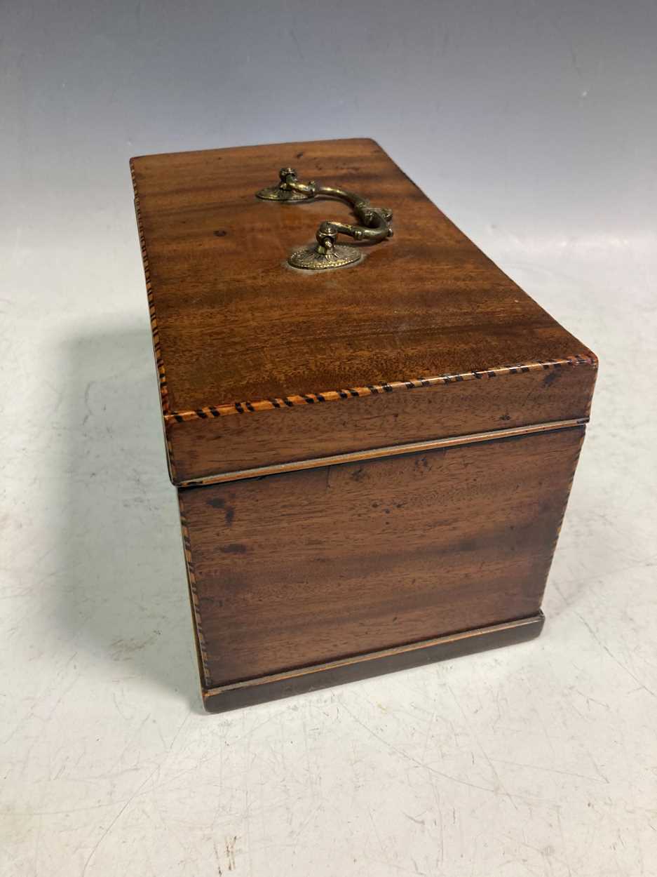 A George III mahogany tea caddy, the hinged lid with brass handle enclosing a three division - Image 6 of 6