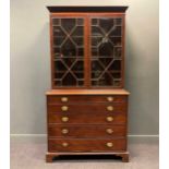 A George III mahogany secretaire bookcase,