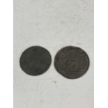 Two late 17th-century pewter commemorative tokens, including an unusual calendar token of 1697 and a