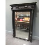 A late Victorian/Edwardian ebonised over mantle mirror, and a small 1960's square-shaped mirror (2)