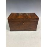 A George III mahogany tea caddy, the hinged lid with brass handle enclosing a three division
