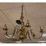 A pair of Continental brass six branch chandeliers, 66cm high and 79cm wide