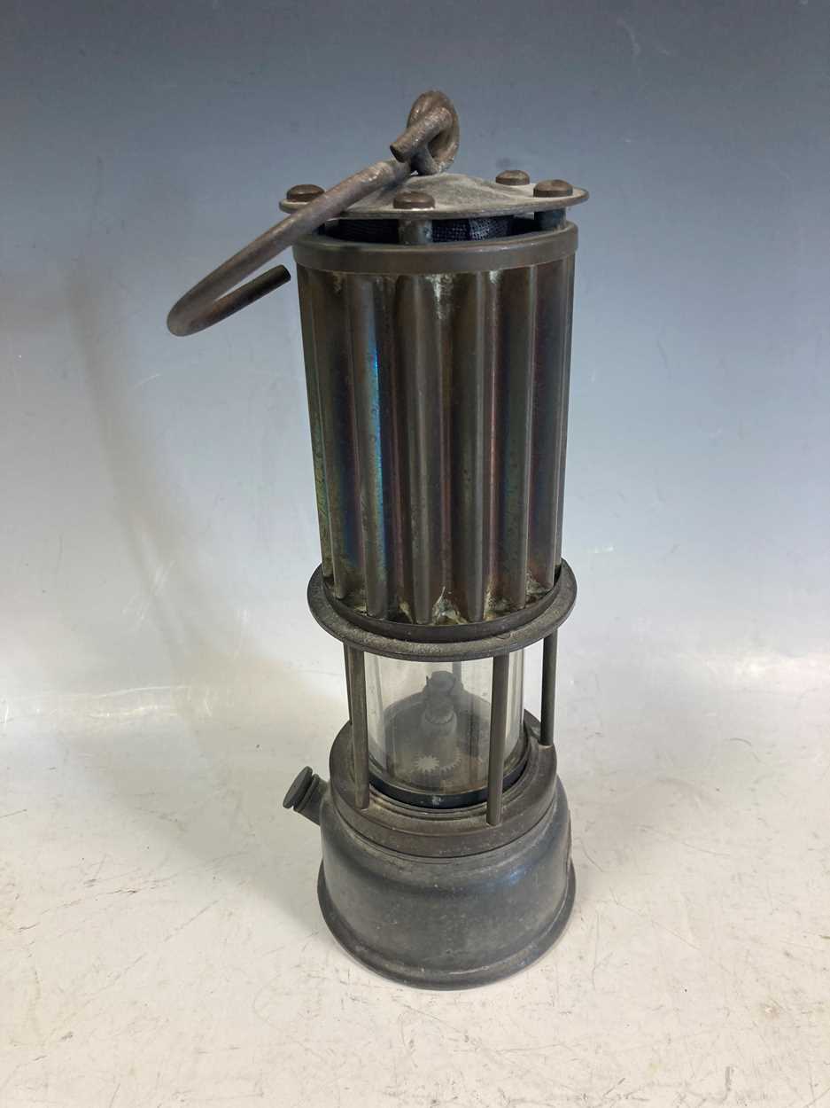 A Miner's lamp by The Premier Lamp Co, Leeds, with corrugated effect upper body, 27cm high - Image 2 of 5