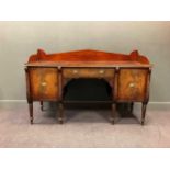 An Irish Regency mahogany sideboard,