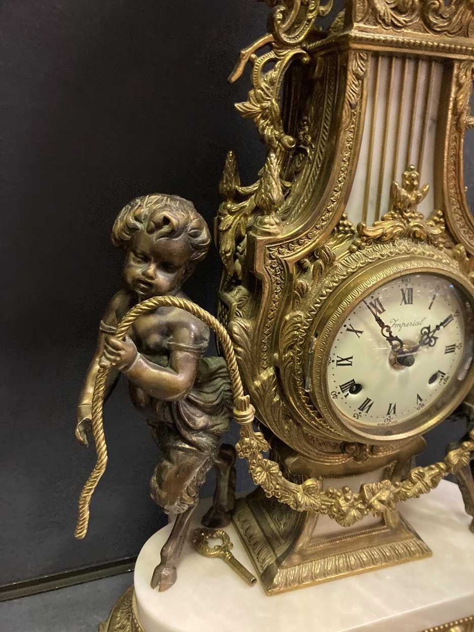 A French style reproduction gilt metal and marble lyre shape mantel clock, 60cm high - Image 2 of 6