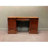 An early Victorian mahogany inverted breakfront sideboard with acanthus carved applied