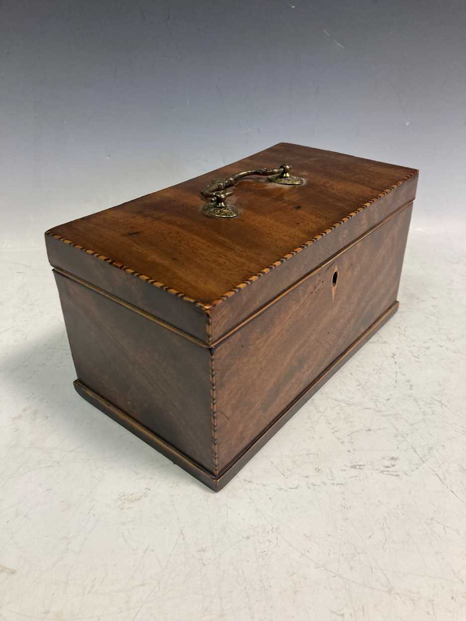 A George III mahogany tea caddy, the hinged lid with brass handle enclosing a three division - Image 2 of 6