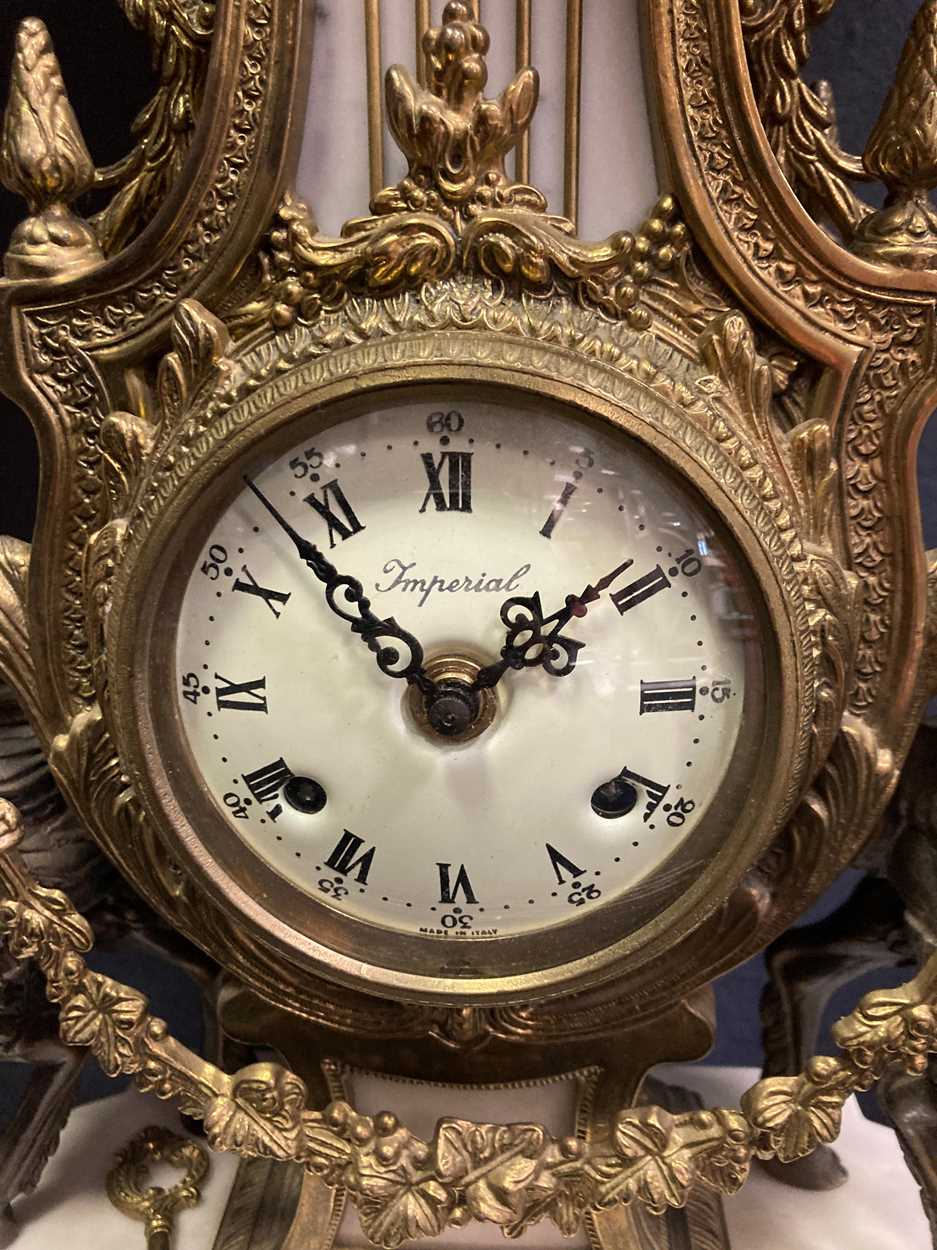 A French style reproduction gilt metal and marble lyre shape mantel clock, 60cm high - Image 4 of 6