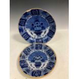 Two late 18th century Delft Peacock pattern chargers, with usual feathery motif spraying from a