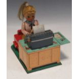 A Linemar battery operated tinplate typing toy 'Busy Secretary', circa 1960's, 19 x 16 x 18cm