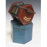 A mahogany 21 key concertina with box, 19th century, no maker's name, 19 x 21 x 18cm