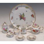A late 19th century Royal Copenhagen childs tea set together with a Royal Copenghagen floral painted
