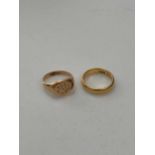 A hallmarked 22ct gold wedding band weight 6.2g, together with a signet ring tested as 18ct gold