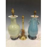 Two china lamps in the Chinese style, one celadon 43cm high, one blue 42cm high, together with a
