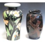 A Japanese lacquered vase and a large pottery vases decorated with flowers, highest 50cmProvenance: