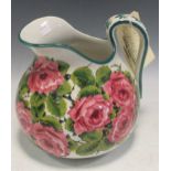 A Wemyss cabbage rose jug with restored handle, 25cm high