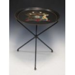 A tole-painted folding table / fire screen decorated with a crest, 52 x 44cm