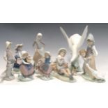 A collection of Lladro, including a turtle dove and various figures (8)