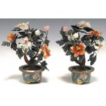 A pair of Oriental miniature decorative cloisonne planters with probably nephrite jade leaves (