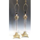 A pair of brass/glass Corinthian column table lamps 55cm high to lamp holder59cm not including