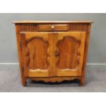 A Louis XVI provincial style cherry wood side cupboard, on cabriole feet99 x 103 x 56cm