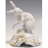 A Vienna porcelain rabbit on naturalistic ground, 12cm high