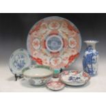 A collection of oriental ceramics wares, including a blue and white Japanese vase decorated with