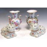 A pair of late 19th century Continental floral painted porcelain baluster vases, with acanthus