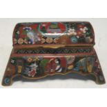 A Japanese cloisonne enamell inkwell, with pen rest to the front, hinged cover with two inkwells,