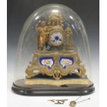 A 19th-century French gilt metal and porcelain panel mantel clock with a figural surmount of a
