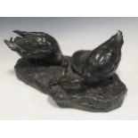 A bronzed composition model of two geese eating a frog, marked 'L.Malsert' 22 x 53 x