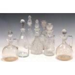 Seven various glass decanters with stoppers (7)