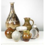 Eight items of studio pottery, including two jugs, a bowl and various vases, tallest vase 48cm