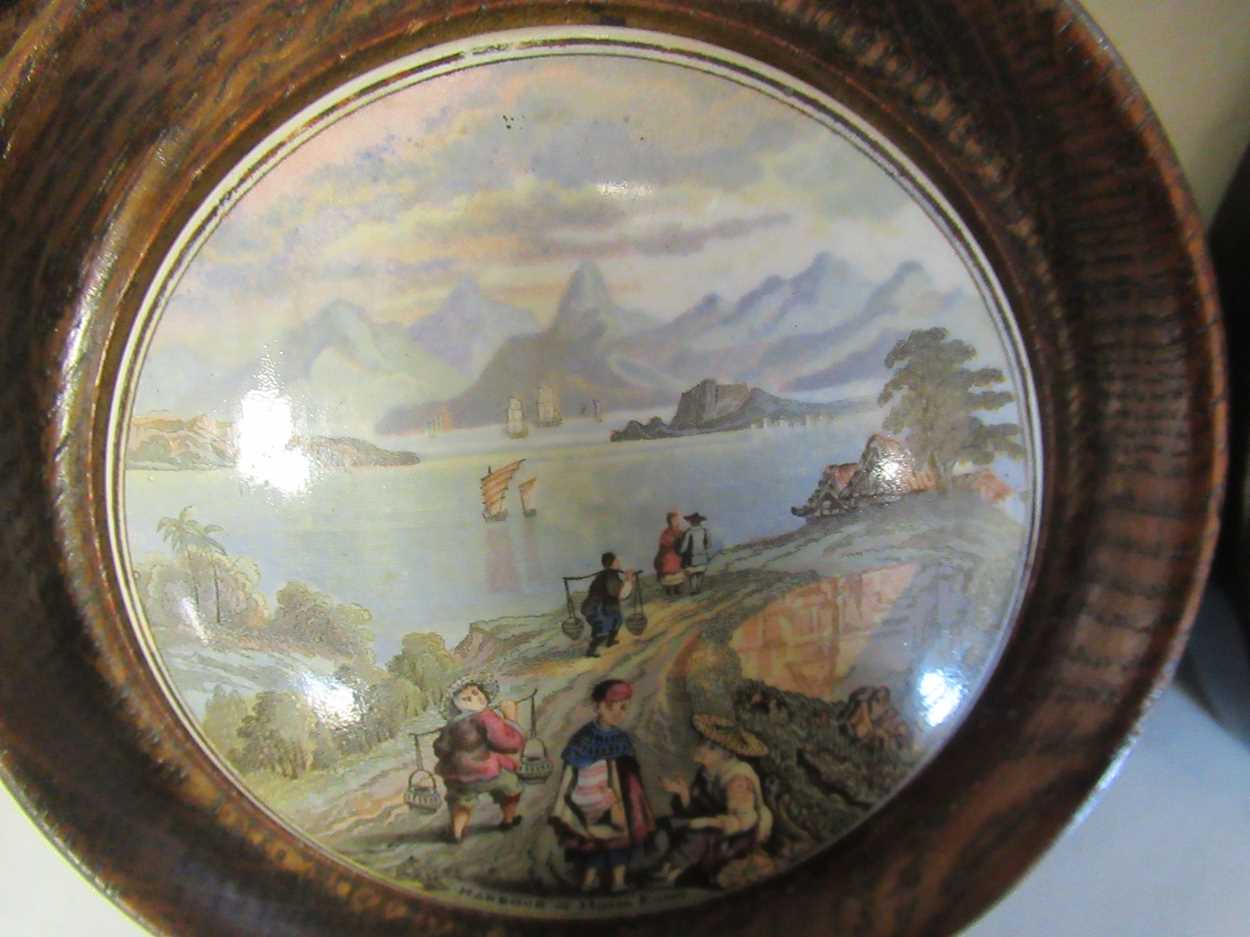 A collection of Victorian and later ceramic pot lids presented as wall plaques with wooden - Bild 2 aus 7