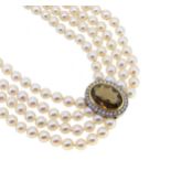 A smoky quartz and diamond set four row pearl choker necklace, 6.7 to 8mm, strung knotted to an oval