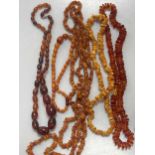 A Collection of five amber necklaces, gross weight 301.9g (5)