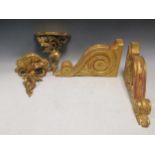 A pair of rococo style gilt painted wall brackets 22 x 20 x 12cm and a pair of Neo-classical style