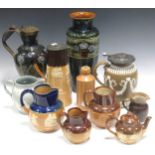 A collection of Doulton Copeland and other stoneware items including vases and pots, the tallest