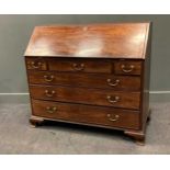 A George III mahogany bureau, the fall front enclosing a fitted interior, 106 x 117 x